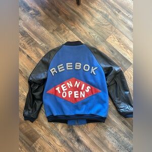"Masterpiece" 90's Reebok Stadium Jacket Reebok Vintage